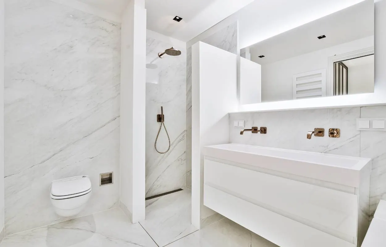 Modern master bathroom with custom tile and lighting